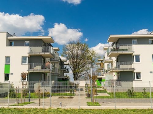 modern-apartment-building-blue-sky-background_162695-4214 (1)